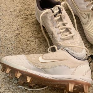 Used softball cleats a lot of wear left in these. White with rose gold